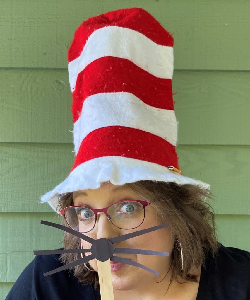 Author dressed up as Dr. Seuss' Cat In The Hat.